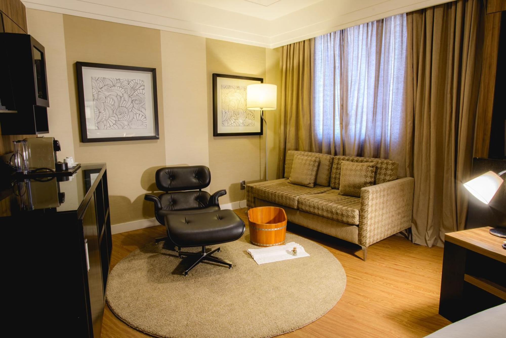 Radisson Alphaville Barueri Exterior foto A living room in a serviced apartment in London